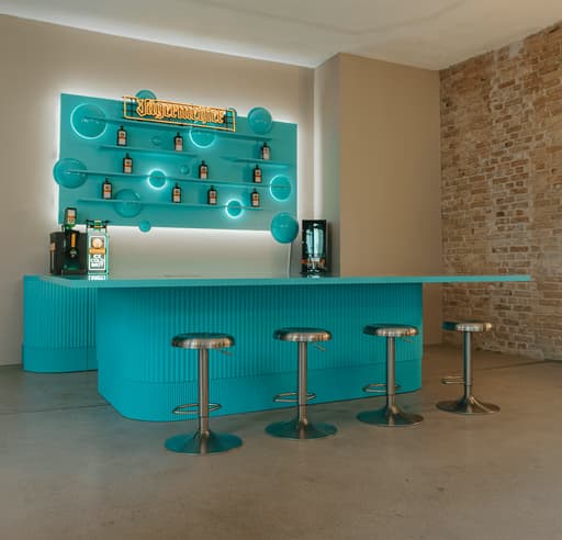 Exposed-brick hall with stage lighting
